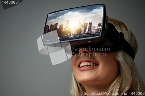 Image of woman in virtual reality headset or 3d glasses