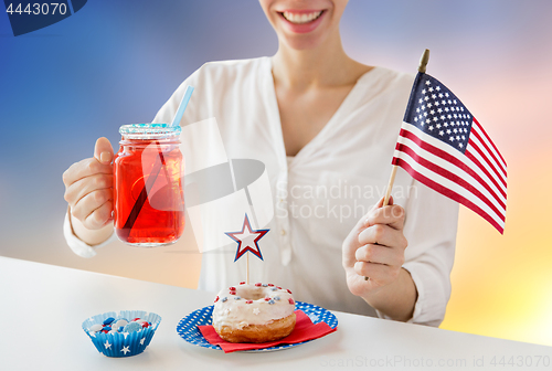 Image of happy woman celebrating american independence day