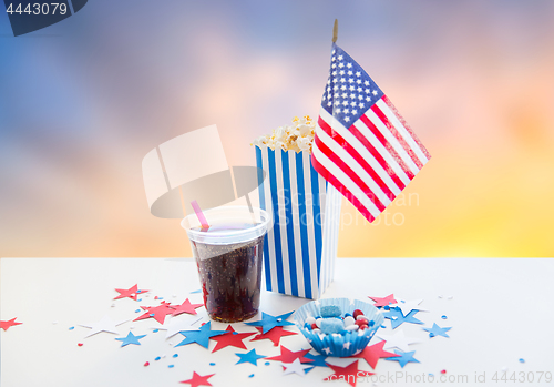 Image of cola and popcorn with candies on independence day