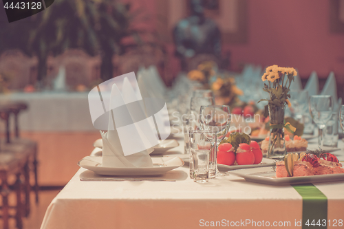 Image of Long served table with dishes