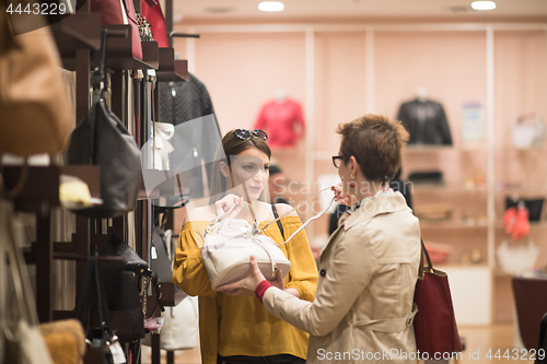 Image of best friend shopping in big mall