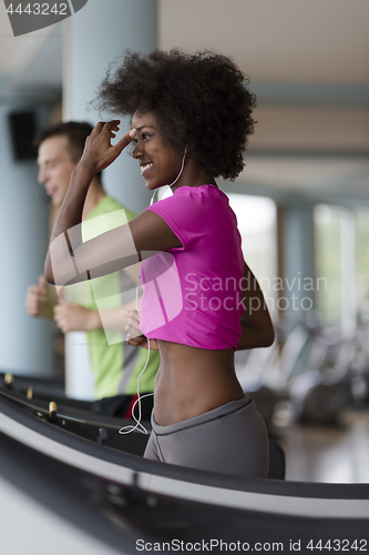 Image of people exercisinng a cardio on treadmill in gym