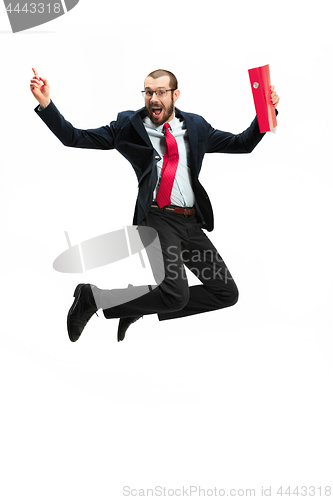 Image of Funny cheerful businessman jumping in air over white background