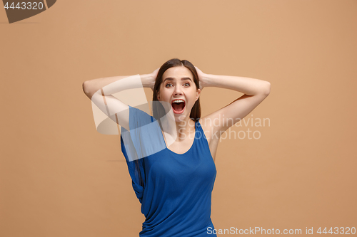 Image of Winning success woman happy ecstatic celebrating being a winner. Dynamic energetic image of female model