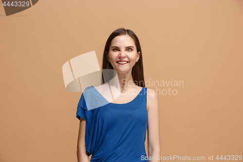 Image of The woman with weird expression isolated on pastel