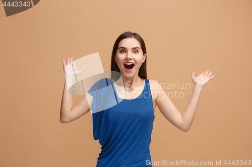 Image of Winning success woman happy ecstatic celebrating being a winner. Dynamic energetic image of female model