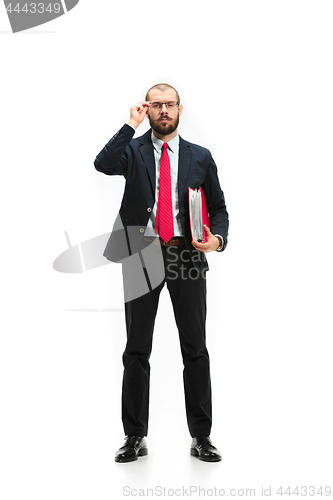 Image of Full body portrait of businessman with folder on white