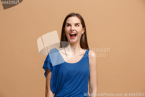 Image of The woman with weird expression isolated on pastel