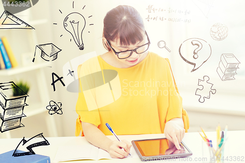 Image of asian woman student with tablet pc at home