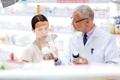 Image of apothecary and woman with drug at pharmacy