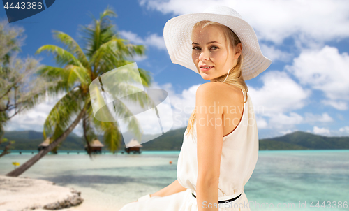 Image of beautiful woman enjoying summer over beach