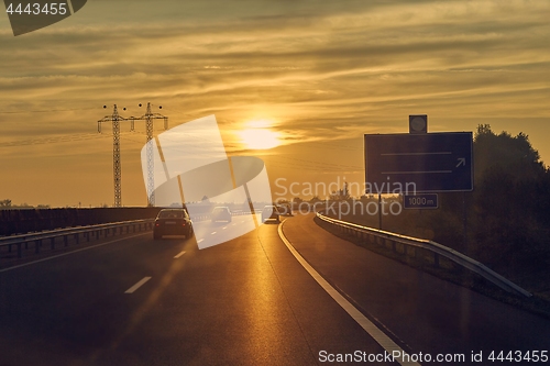 Image of Driving in sunset