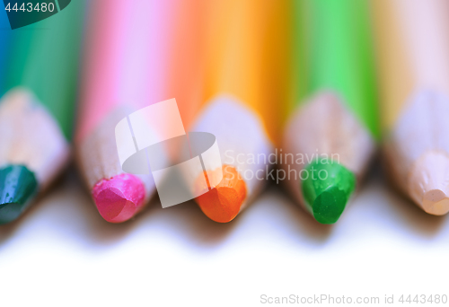 Image of Colorful pencils in a row. Close-up