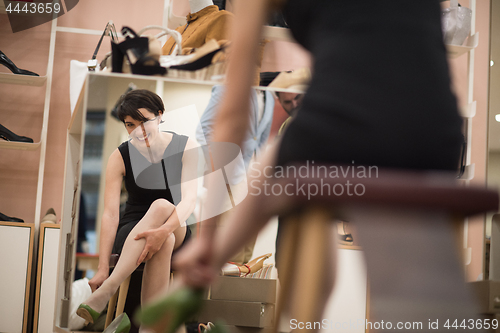 Image of Woman Trying New Shoes