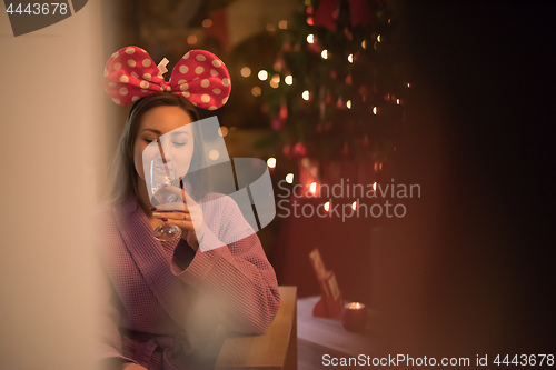 Image of woman drinking champagne at spa