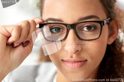 Image of portrait of african american woman in glasses