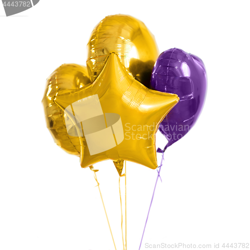 Image of close up of helium balloons over white background