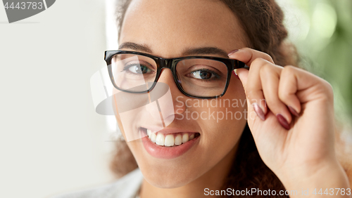 Image of portrait of african american woman in glasses