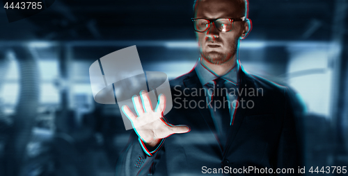 Image of close up of businessman with something invisible