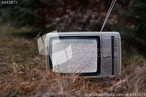 Image of TV no signal in grass