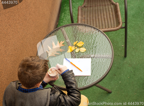 Image of Boy eating sweets