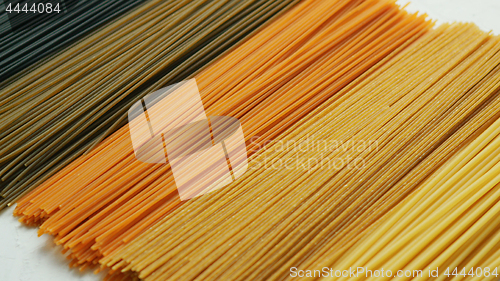 Image of Uncooked pasta in row