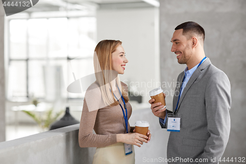 Image of businesswoman and businessman at coffee break