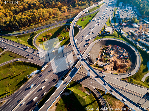 Image of Aerial view of a freeway intersection traffic trails in Moscow.