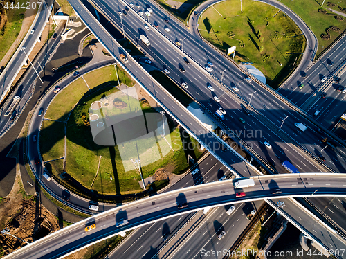 Image of Aerial view of a freeway intersection traffic trails in Moscow.