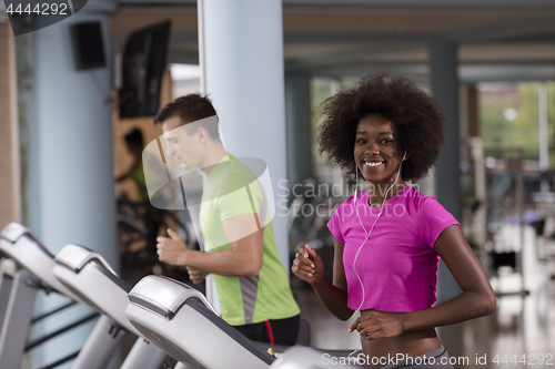 Image of people exercisinng a cardio on treadmill