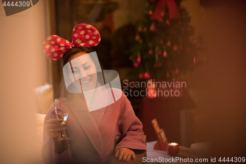 Image of woman drinking champagne at spa