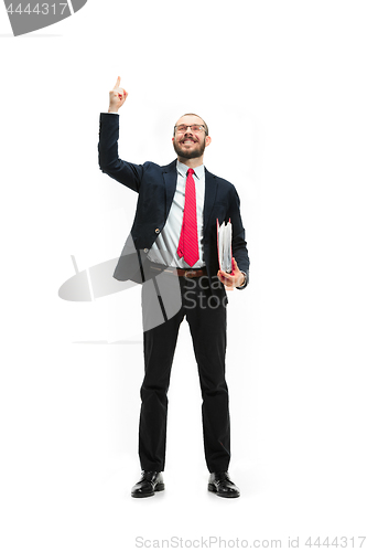 Image of Full body portrait of businessman with folder on white