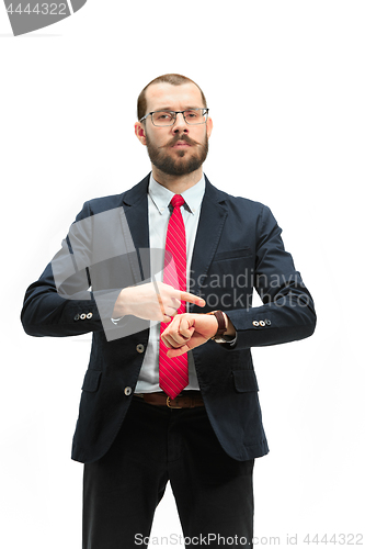 Image of businessman looking at his watch on his hand, watching the time