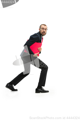 Image of Full body portrait of businessman with folder on white