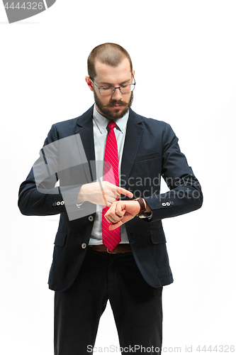 Image of businessman looking at his watch on his hand, watching the time