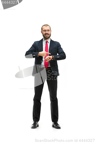 Image of businessman looking at his watch on his hand, watching the time