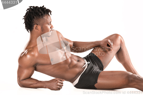 Image of Fit young man with beautiful torso isolated on white background