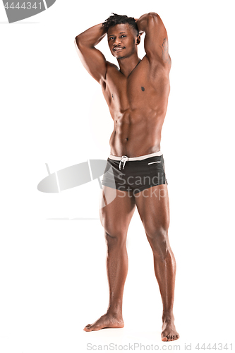 Image of Fit young man with beautiful torso isolated on white background