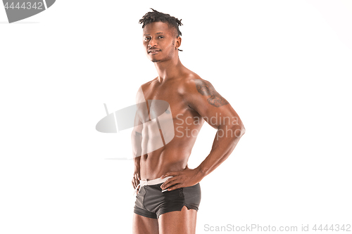 Image of Fit young man with beautiful torso isolated on white background