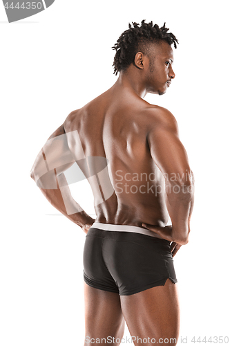 Image of Fit young man with beautiful torso isolated on white background