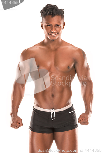 Image of Fit young man with beautiful torso isolated on white background