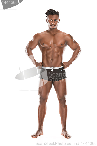 Image of Fit young man with beautiful torso isolated on white background