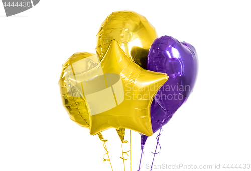 Image of close up of helium balloons over white background