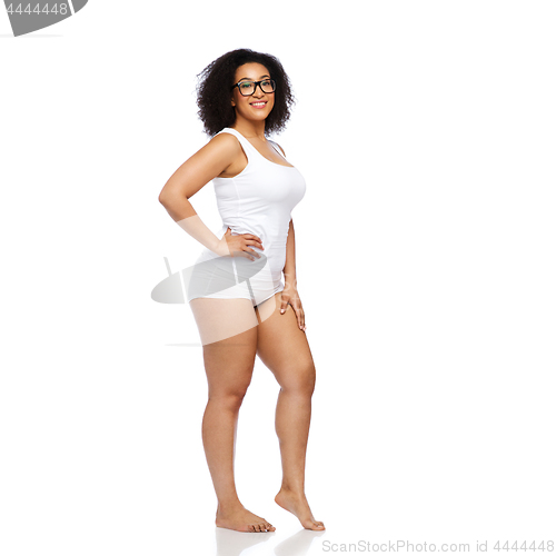 Image of happy african american woman in white underwear