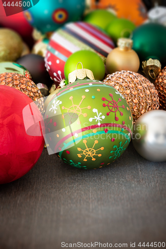 Image of Christmas decoration glass balls on a wooden ground