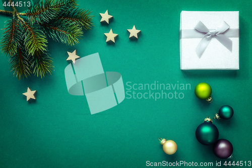 Image of Christmas decoration background green with silver gift box