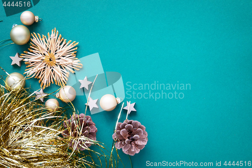 Image of Christmas decoration background turquoise with straw star