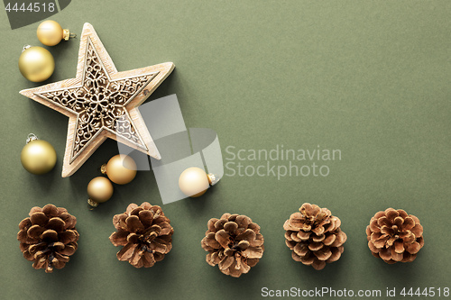 Image of Christmas decoration background with pine cones and a star