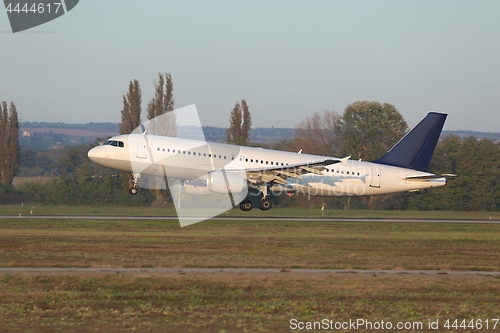 Image of Plane landing on runway