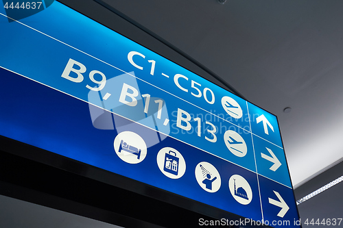 Image of Airport terminal direction signs